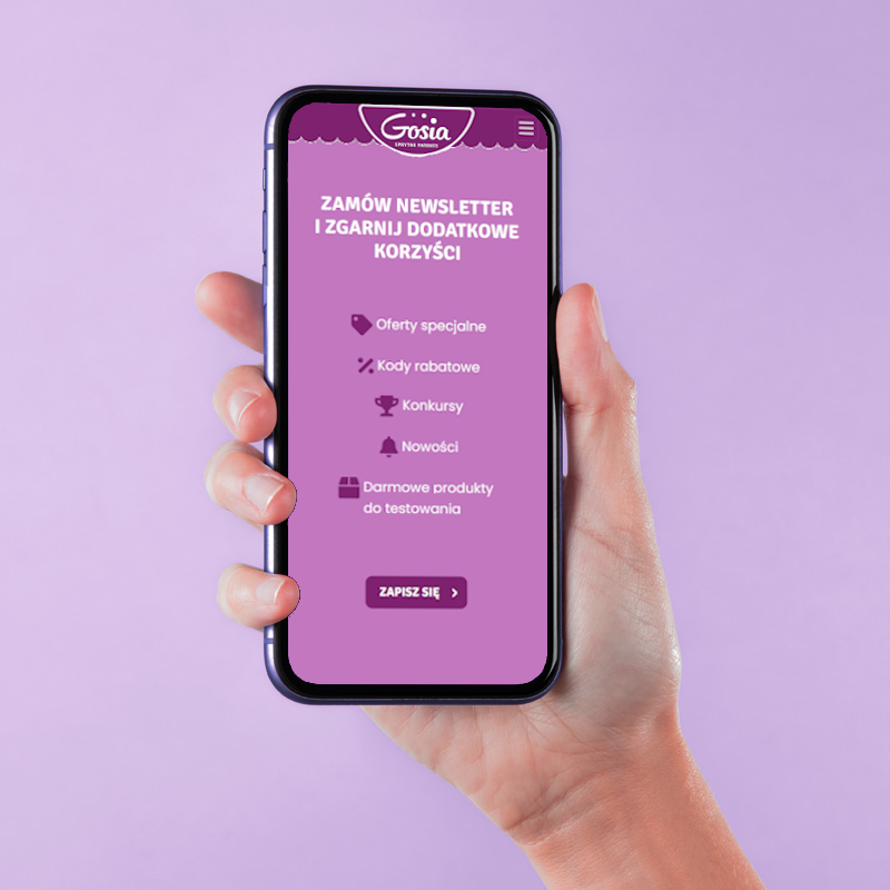 ręka trzymająca telefon z otworzoną stroną internetową marki Gosia
